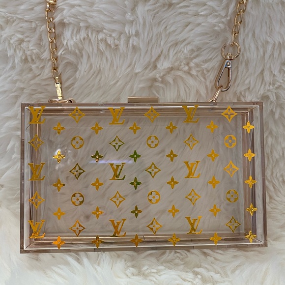 gold acrylic clutch